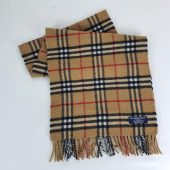 Genuine Burberry wool scarf in an excellent condition Beige colour Short  size Length 140cm