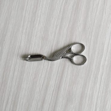 Metal nutcracker, bird design, elegant decoration, details, kitchen accessory, refined retro utensil, original gift, tableware