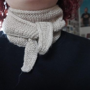 Mini hand knitted wool scarf for women